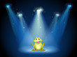 A smiling frog at the center of the stage