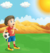 A boy holding a soccer ball sweating