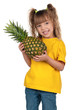 Photo: Little girl with pineapple Little girl with pineapple