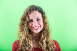 Photo: Beautiful Young Woman on Green Background Beautiful Young Woman on Green Background