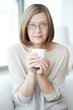 Photo: Woman with cup Woman with cup