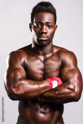 Photo: Young handsome athlete, arms crossed Young handsome athlete, arms crossed
