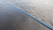 pipe laid in the river along the coast