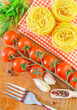 raw pasta and tomato