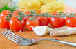 raw pasta and tomato