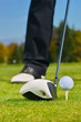 Playing golf. Golf club and ball. Preparing to shot