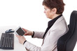 Photo: Businesswoman in office with tablet PC Businesswoman in office with tablet PC