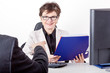 Business woman with folder speaks to man in a suit