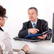 Photo: Businessman and businesswoman discuss business Businessman and businesswoman discuss business