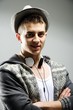 Man with hat - Young male in white t-shirt and jeans isolated on