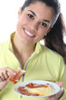 Model Released. Young Woman Eating Antipasti