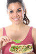 Model Released. Young Woman Eating Chicken and Couscous Salad