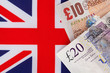 Pound notes on a Union Jack flag