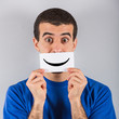 Young Man with Smiley Emoticon