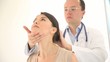 Woman at the doctor checking a neck injury