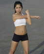 Active fit woman stretching before work out