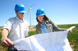 Engineers checking on industrial site