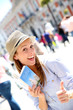 Happy girl visiting Madrid capital, Spain