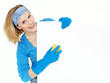 Cleaning woman presenting white message board