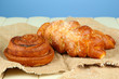 Composition with buns in wicker basket,