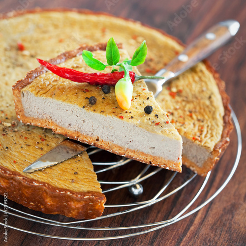Photo: Tart with chicken liver and pepper, selective focus Tart with chicken liver and pepper, selective focus