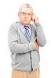 Serious mature man with plaster on his forehead