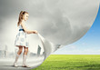 Little girl turning page