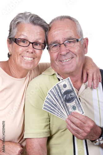 Photo: Couple âgé tenant une liasse de billets. Couple âgé tenant une liasse de billets.
