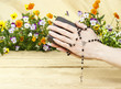 Prayer over old Holy Bible. Wooden background.