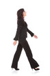 business woman walks to side