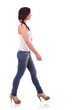 casual woman walking to side