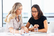 Two Businesswomen Meeting In Office