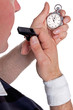 Photo: Referee checking stopwatch Referee checking stopwatch