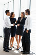 Business Team Having Informal Meeting In Office
