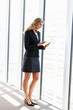 Businesswoman Using Digital Tablet In Office