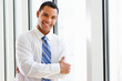 Portrait Of Smiling Businessman In Office
