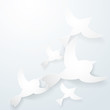 Two origami birds on a white background