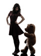 strange young woman and vicious teddy bear  silhouette