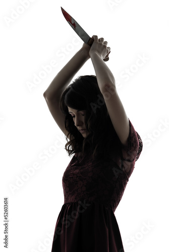 Photo: strange young woman killer holding bloody knife silhouette strange young woman killer holding bloody knife silhouette