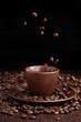 Photo: Coffee beans flow in a cup Coffee beans flow in a cup