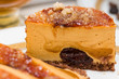 Macro of caramel cake with chocolate cream and caramelized sugar