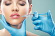 Beauty Woman face surgery close up portrait.