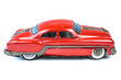 Fifties vintage red car toy isolated on white