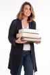 Woman with pile of books
