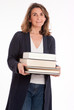 Woman with pile of books
