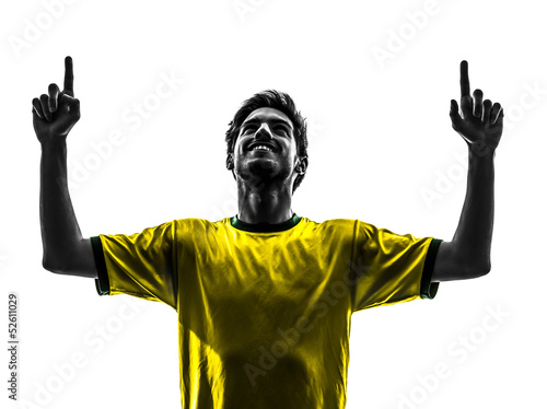 Photo: brazilian soccer football player young happiness joy man silhoue brazilian soccer football player young happiness joy man silhoue