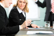 Photo: Business meeting with work on contract Business meeting with work on contract