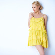Pretty elegant woman wearing yellow dress