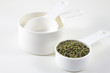 green beans and measuring cup