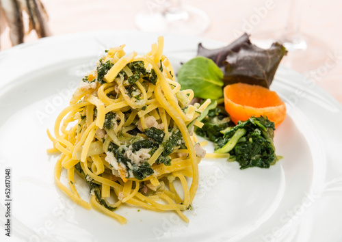 Photo: Tagliolini con tinca e bietole , fuoco selettivo- Italian pasta Tagliolini con tinca e bietole , fuoco selettivo- Italian pasta
